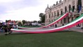 Large Italian tricolor flags unfurled in front of Villa Pisani in Stra for the 40th Wizz Air Venicemarathon.